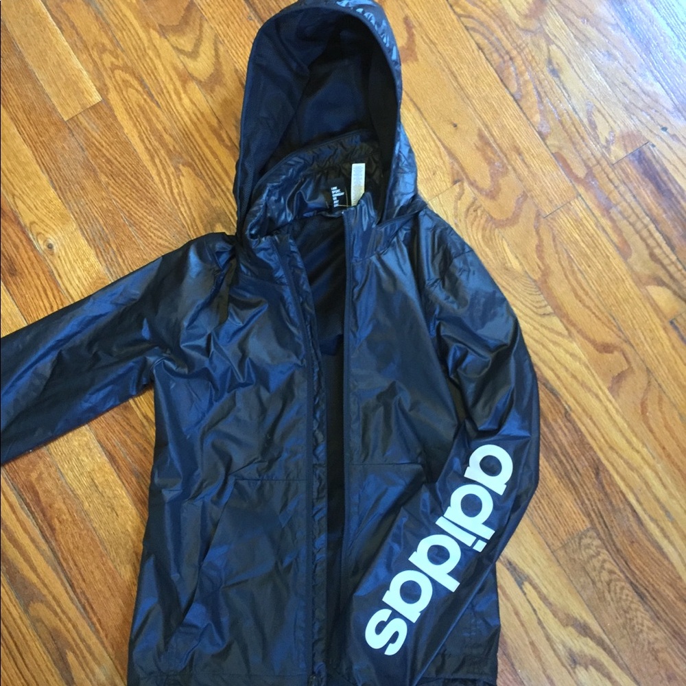 Adidas windbreaker with compact hoodie!